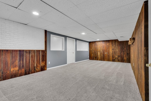 1626 Geranium Dr, Lewis Center, OH 43035 - finished below grade area featuring wood walls, carpet, and a paneled ceiling