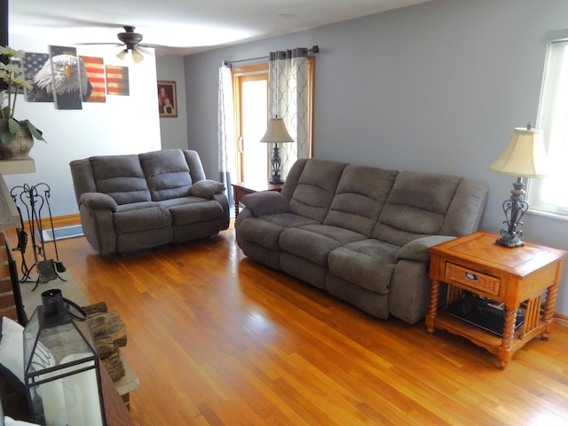 1766 Thrailkill Rd, Grove City, OH 43123 - living area featuring a ceiling fan, light wood-type flooring, and plenty of natural light