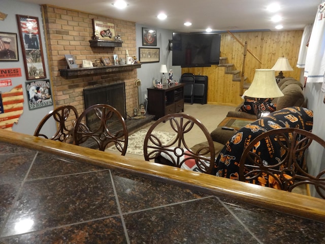 1766 Thrailkill Rd, Grove City, OH 43123 - living room with wooden walls, stairs, and a fireplace