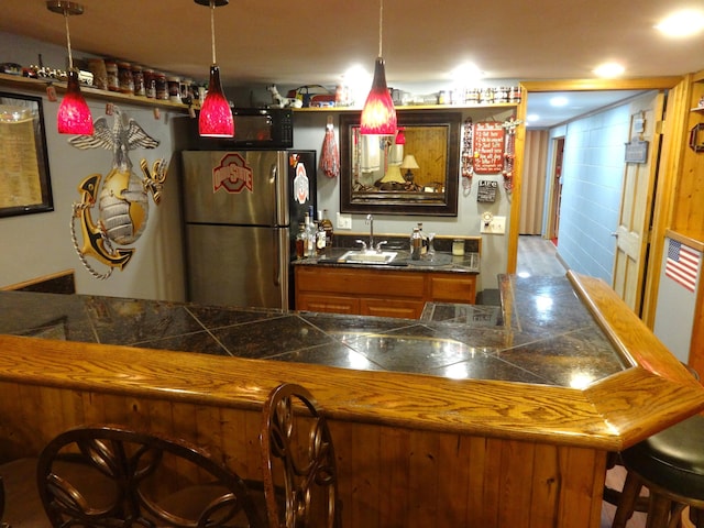 1766 Thrailkill Rd, Grove City, OH 43123 - indoor wet bar with freestanding refrigerator and pendant lighting