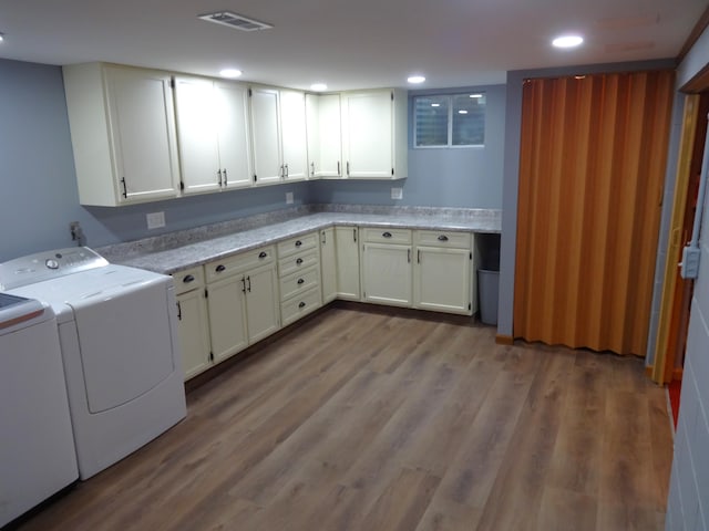 1766 Thrailkill Rd, Grove City, OH 43123 - washroom featuring cabinet space, washing machine and dryer, wood finished floors, and recessed lighting