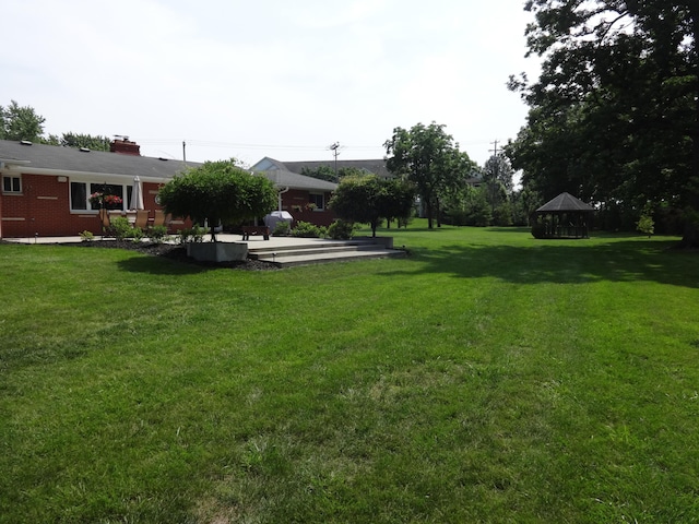1766 Thrailkill Rd, Grove City, OH 43123 - view of grassy yard featuring a gazebo and a patio