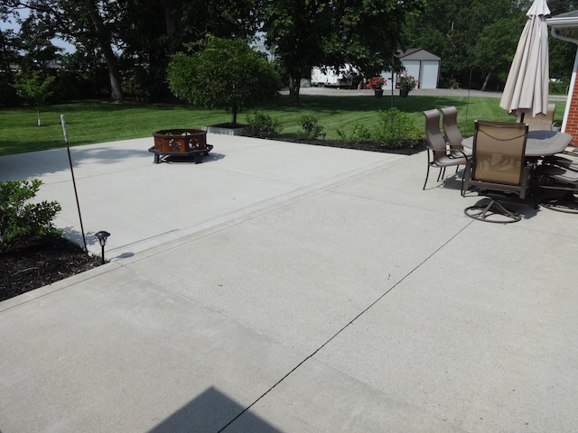 1766 Thrailkill Rd, Grove City, OH 43123 - view of patio featuring a fire pit and outdoor dining area
