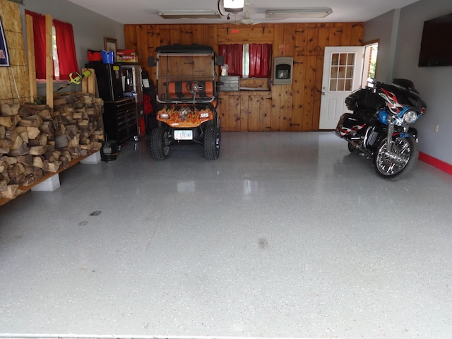 1766 Thrailkill Rd, Grove City, OH 43123 - garage with wooden walls and a garage door opener
