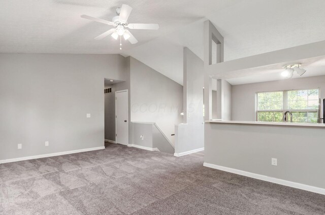 5727 Sundial Dr, Galloway, OH 43119 - empty room featuring carpet, a ceiling fan, and lofted ceiling