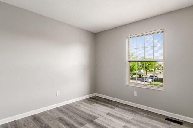 5727 Sundial Dr, Galloway, OH 43119 - spare room with wood finished floors