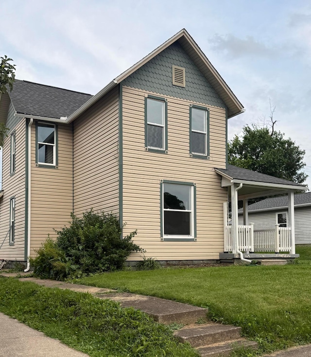 274 Woods Ave, Newark, OH 43055 - view of front facade featuring a front lawn and a porch