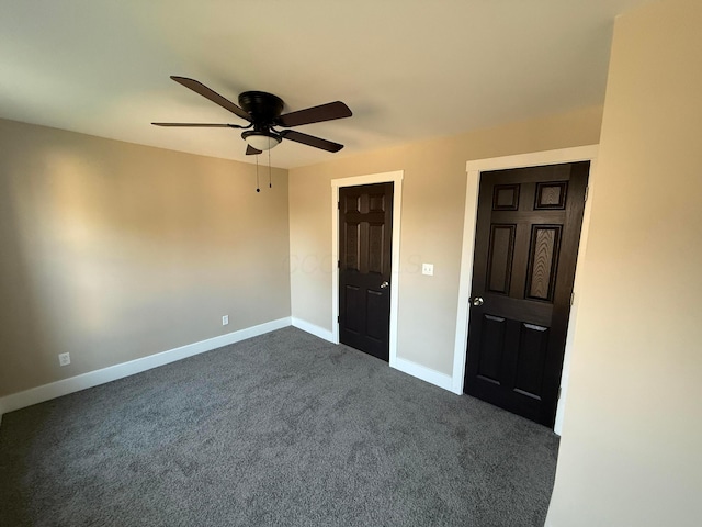 274 Woods Ave, Newark, OH 43055 - spare room featuring a ceiling fan and dark carpet
