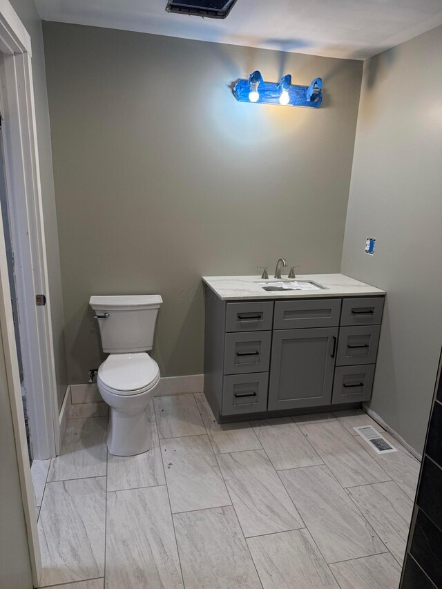 274 Woods Ave, Newark, OH 43055 - bathroom featuring vanity and marble look tiles