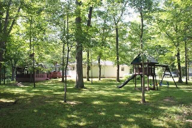 6781 Thoreau Ln NE, Baltimore, OH 43105 - view of green lawn featuring a playground