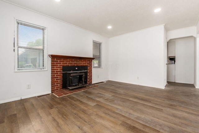 1680 Linwood Ave, Columbus, OH 43207 - unfurnished living room with wood finished floors, recessed lighting, and a fireplace
