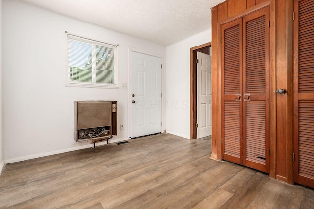 1680 Linwood Ave, Columbus, OH 43207 - entryway featuring wood finished floors and a textured ceiling