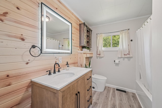 15586 Stump Run, Laurelville, OH 43135 - full bathroom with wood walls, vanity, ornamental molding, wood finished floors, and shower / bath combo