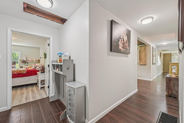 15586 Stump Run, Laurelville, OH 43135 - hallway with dark wood-style floors and baseboards