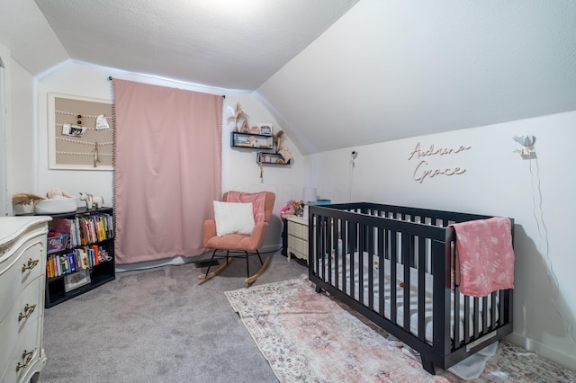 647 Harrison St, Washington Court House, OH 43160 - carpeted bedroom with vaulted ceiling and a crib