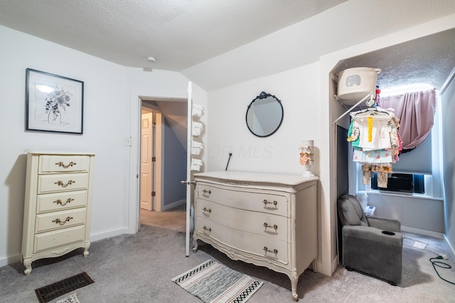647 Harrison St, Washington Court House, OH 43160 - bedroom featuring light carpet, cooling unit, and vaulted ceiling