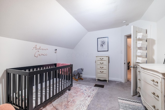647 Harrison St, Washington Court House, OH 43160 - bedroom featuring lofted ceiling, carpet floors, and a crib