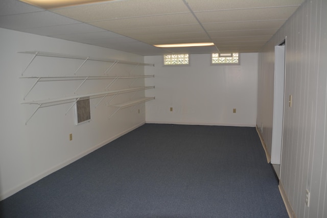 463 Denwood Dr S, Gahanna, OH 43230 - below grade area with a paneled ceiling and dark carpet