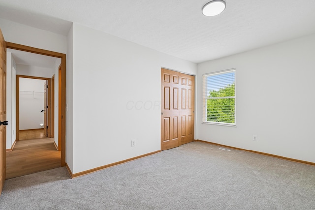 6872 Spring Bloom Dr, Canal Winchester, OH 43110 - unfurnished bedroom with carpet floors and a closet
