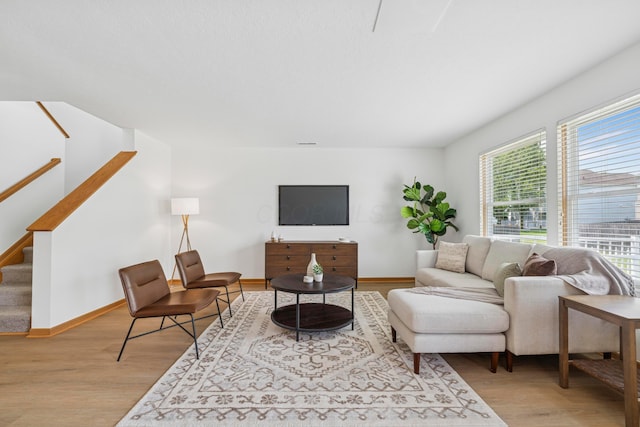 6872 Spring Bloom Dr, Canal Winchester, OH 43110 - living room with wood finished floors and stairs