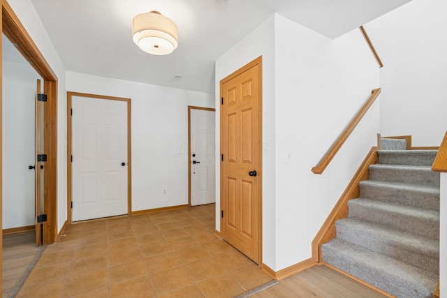 6872 Spring Bloom Dr, Canal Winchester, OH 43110 - hallway with stairway and baseboards