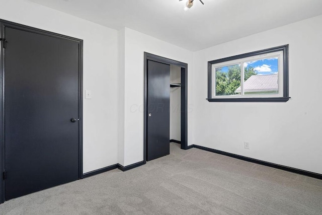 536 Pierce Ave, Columbus, OH 43213 - unfurnished bedroom featuring light colored carpet and a closet