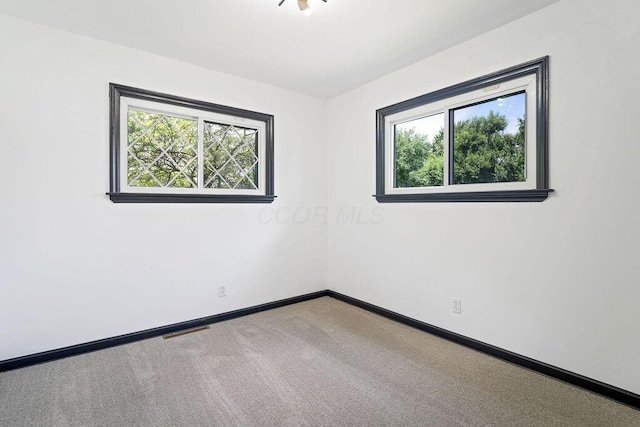 536 Pierce Ave, Columbus, OH 43213 - carpeted spare room with baseboards