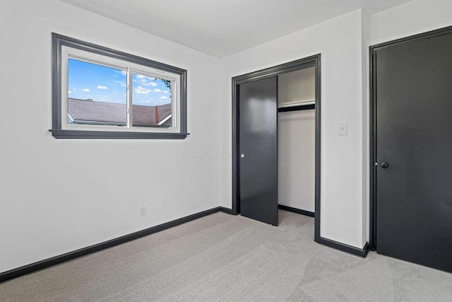 536 Pierce Ave, Columbus, OH 43213 - unfurnished bedroom featuring light colored carpet and a closet