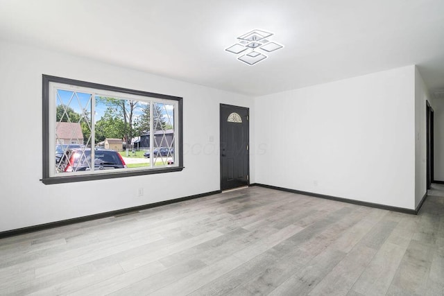 536 Pierce Ave, Columbus, OH 43213 - empty room with light wood finished floors and baseboards