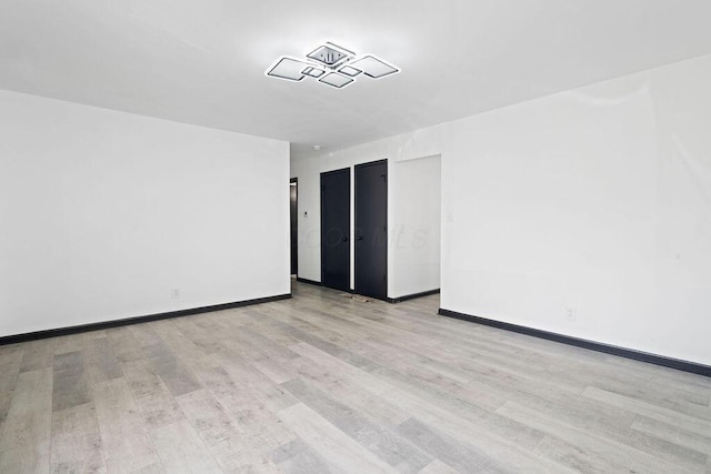 536 Pierce Ave, Columbus, OH 43213 - spare room with light wood-style flooring and baseboards