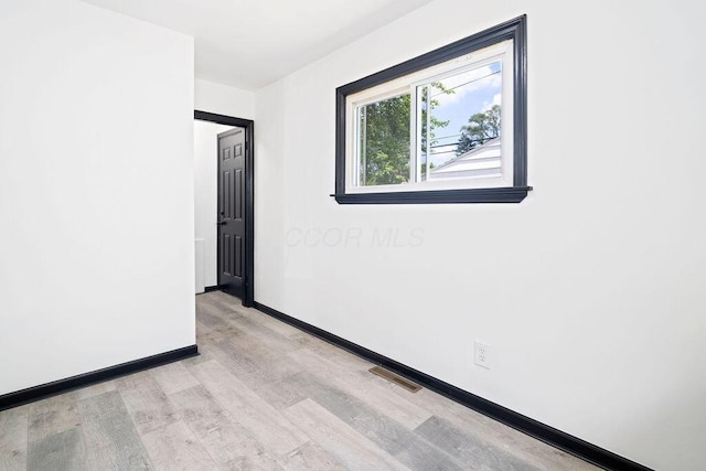 536 Pierce Ave, Columbus, OH 43213 - unfurnished room featuring light wood finished floors and baseboards