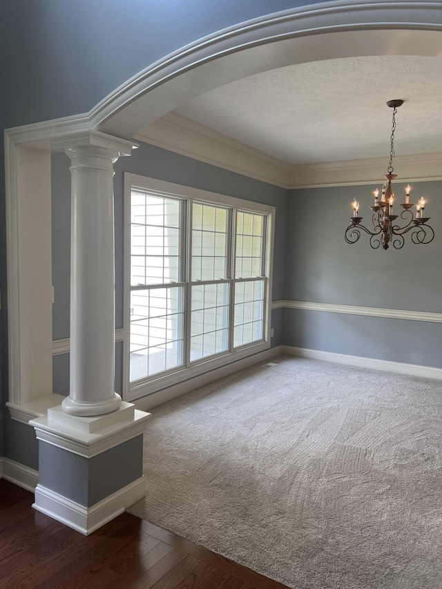 8730 Swisher Creek Xing, New Albany, OH 43054 - empty room with decorative columns, ornamental molding, a chandelier, and wood finished floors