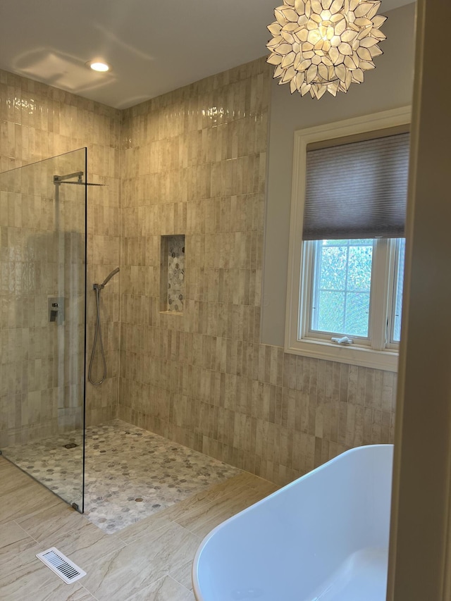 8730 Swisher Creek Xing, New Albany, OH 43054 - bathroom featuring a freestanding tub and walk in shower