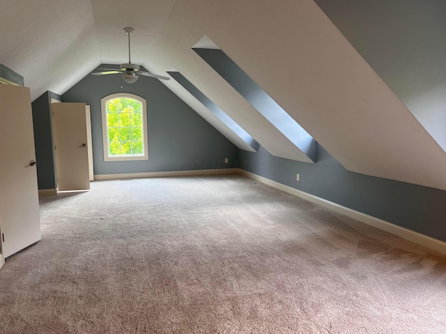 8730 Swisher Creek Xing, New Albany, OH 43054 - additional living space featuring ceiling fan, a skylight, lofted ceiling, and carpet flooring