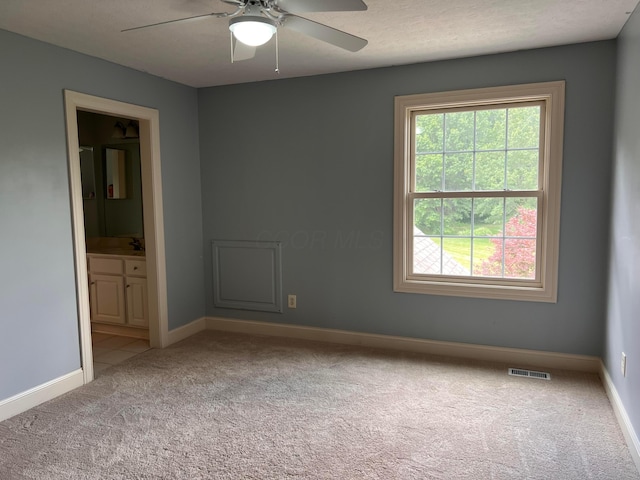 8730 Swisher Creek Xing, New Albany, OH 43054 - empty room featuring light carpet, ceiling fan, and healthy amount of natural light