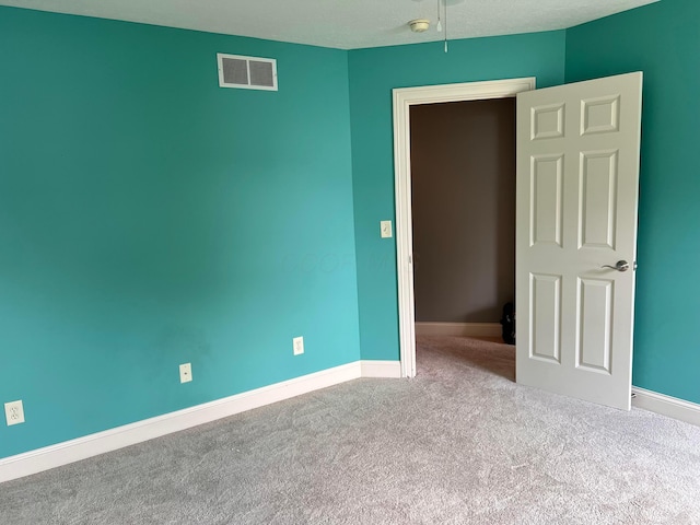 8730 Swisher Creek Xing, New Albany, OH 43054 - spare room with carpet and a smoke detector