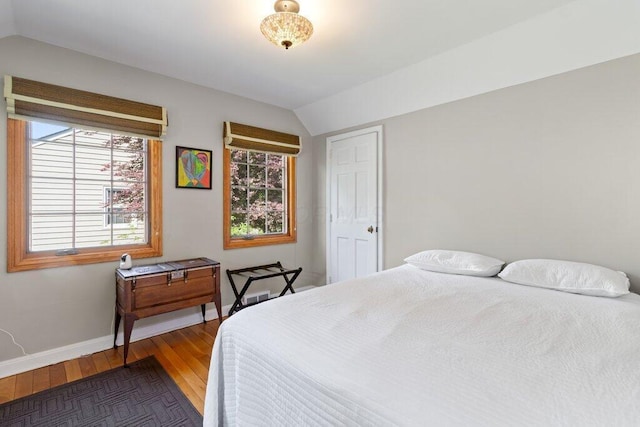 1855 Suffolk Rd, Columbus, OH 43221 - bedroom with lofted ceiling, wood finished floors, and a closet