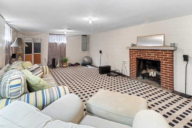 1855 Suffolk Rd, Columbus, OH 43221 - living area with electric panel, a brick fireplace, and concrete block wall