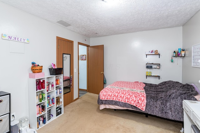 508 Carolyn Rd, Washington Court House, OH 43160 - bedroom with light colored carpet and a textured ceiling