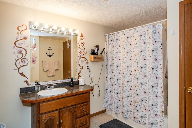 508 Carolyn Rd, Washington Court House, OH 43160 - bathroom featuring tile patterned floors, vanity, a textured ceiling, and shower / bathtub combination with curtain
