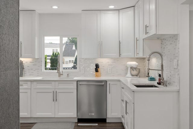 50 S Kellner Rd, Columbus, OH 43209 - kitchen featuring stainless steel dishwasher, white cabinets, tasteful backsplash, light countertops, and recessed lighting