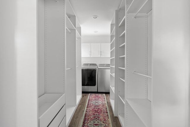 50 S Kellner Rd, Columbus, OH 43209 - spacious closet featuring washing machine and clothes dryer and dark wood-style flooring