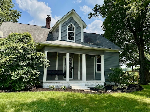 4640 Chillicothe Lancaster Rd SW, Lancaster, OH 43130 - view of front of property with a porch, a front lawn, and a chimney