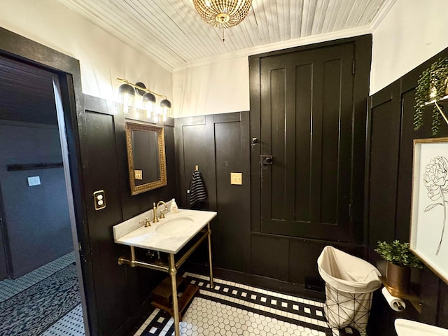 4640 Chillicothe Lancaster Rd SW, Lancaster, OH 43130 - bathroom featuring ornamental molding, a wainscoted wall, and wooden ceiling