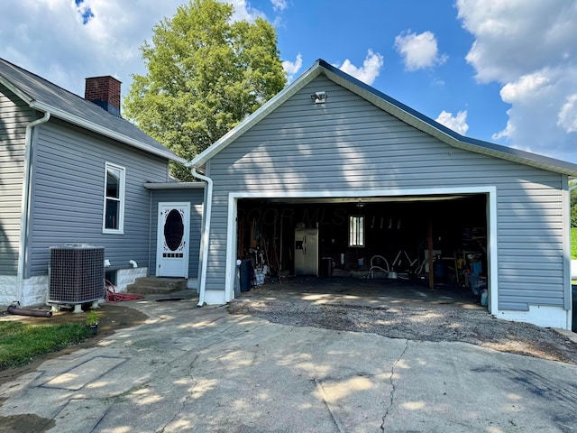 4640 Chillicothe Lancaster Rd SW, Lancaster, OH 43130 - view of home's exterior featuring a garage, a chimney, and entry steps