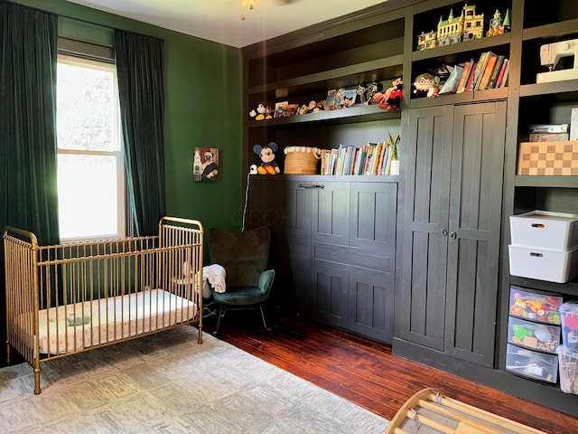4640 Chillicothe Lancaster Rd SW, Lancaster, OH 43130 - bedroom featuring a nursery area and wood finished floors