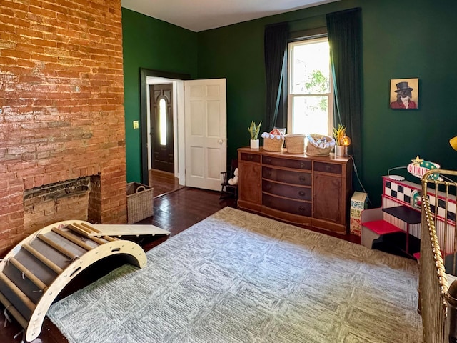4640 Chillicothe Lancaster Rd SW, Lancaster, OH 43130 - bedroom with wood finished floors and a brick fireplace