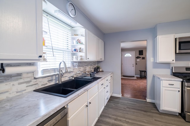 1221 S Main St, Washington Court House, OH 43160 - kitchen featuring stainless steel appliances, white cabinets, backsplash, and open shelves