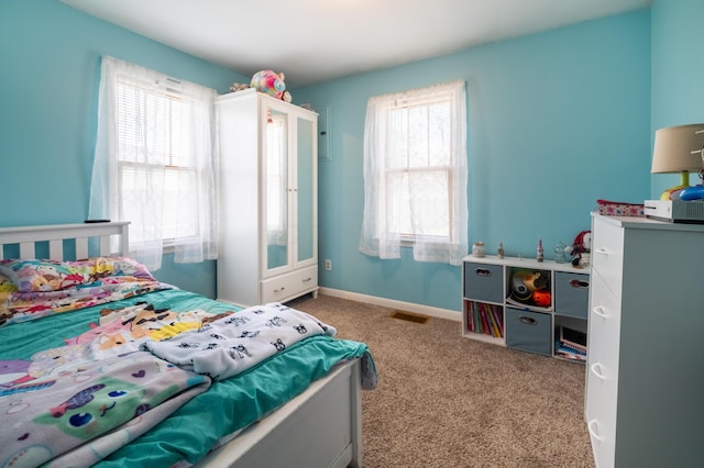 1221 S Main St, Washington Court House, OH 43160 - carpeted bedroom with multiple windows