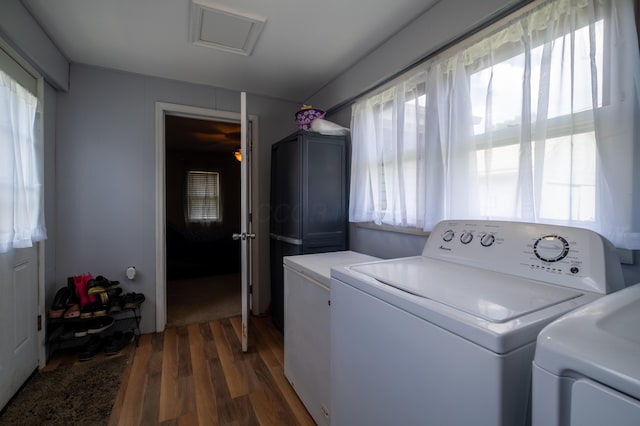 1221 S Main St, Washington Court House, OH 43160 - laundry room with separate washer and dryer and wood finished floors